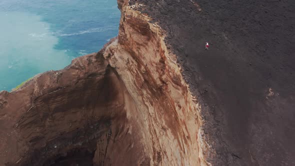 Tourist Exploring Nature of Capelinhos Volcano Faial Island Azores Portugal