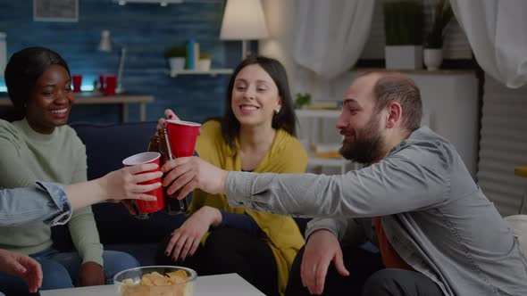 Multiracial Friends Laughingwhile Enjoying Night Party Drinking Beer
