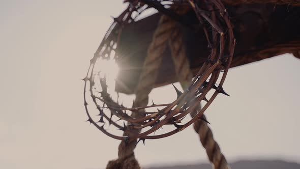 The Cross for the Crucifixion Stands on the Hill with Wreath of Thorns on It