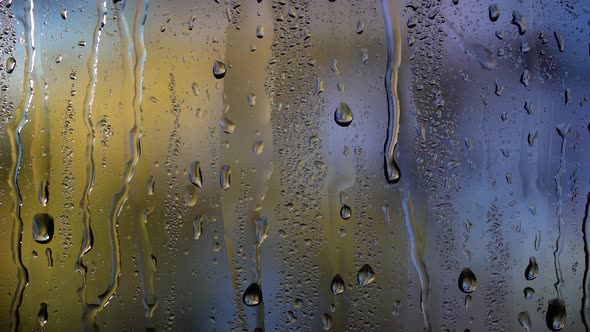 Rain Drops on Window Glass . Blur Background
