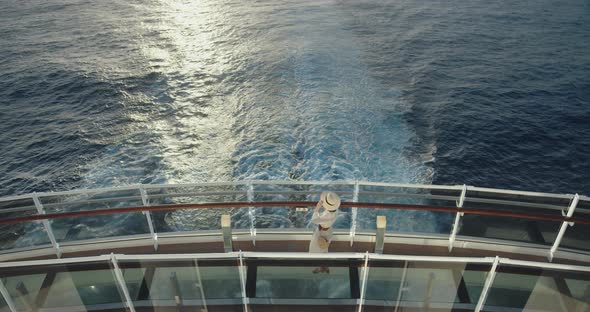 Beautiful woman in a dress on a ship. Shot on Black Magic Cinema Camera