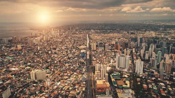 Sun Cityscape of Port Town Manila Aerial