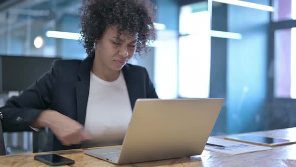 Tired African Businesswoman Having Back Pain at Work