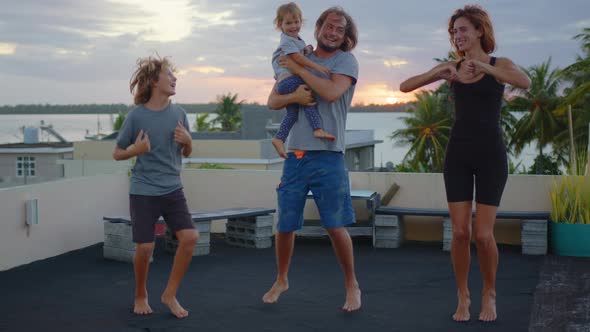 Family Dance on the Roof of the House