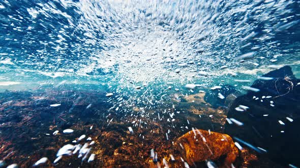 Underwater View of the Rapid Clean River with Rocky Bottom Flowing in Brazilian Mountains