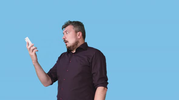 Phone Scam Wtf Reaction Shocked Man Weird Call Gif alt