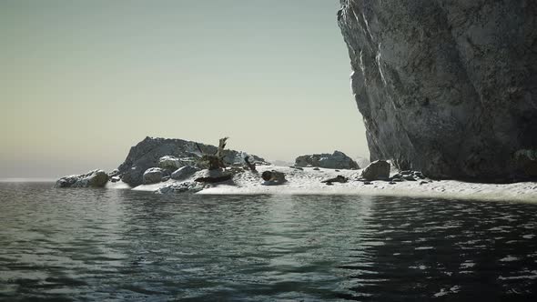 Rocky Ocean Coast with Mountains and a Beautiful Sand Beach