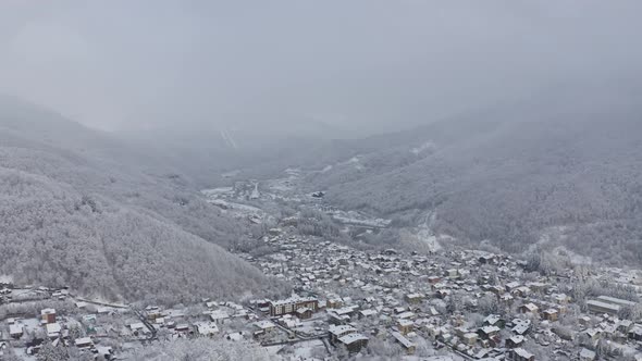 Aerial View Winter Countryside Village Infrastructure Surrounded By Snowflakes