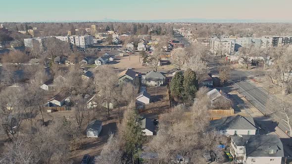 A drone drops down over the east side of suburban Greeley Colorado showing the older architecture an