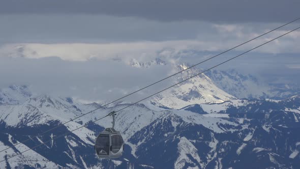 Gondola lifts riding in the mountains