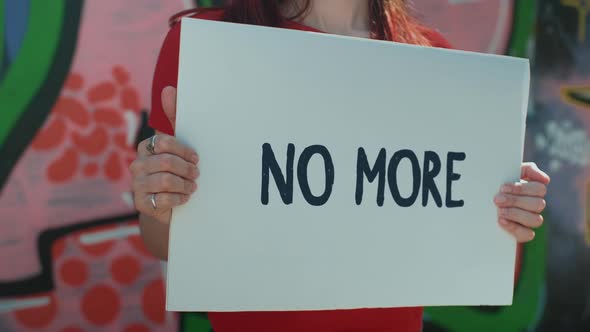 Protester slogan NO more shows disagreement of a society with political decision