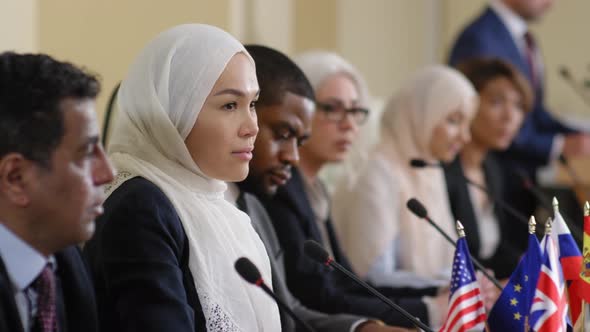 Muslim Female Politician Talking with Journalists at Press Conference