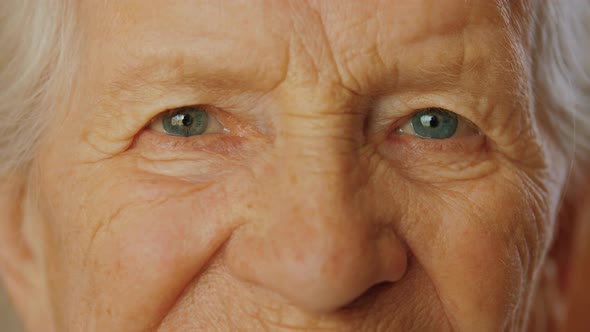 Eyes of Old Woman Looking at Camera Close Up