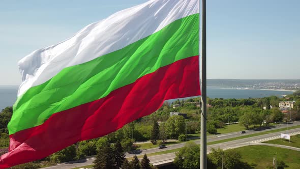 Bulgaria Flag Against City Varna at Summer Day