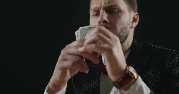 Man Playing Cards and Thinking Isolated