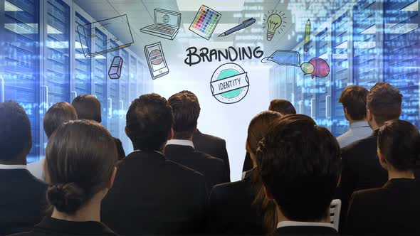 Business people looking at digital screen showing branding