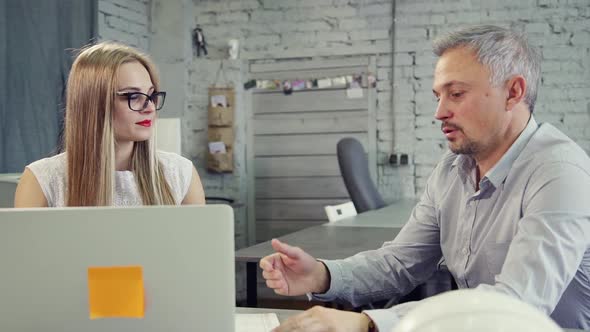 Collaboration in Office of Man and His Assistant Lady