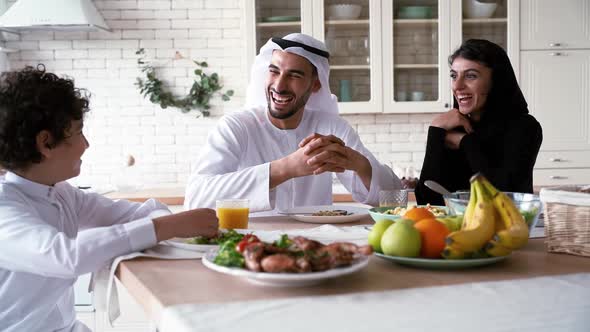 arabian family spending time together at home