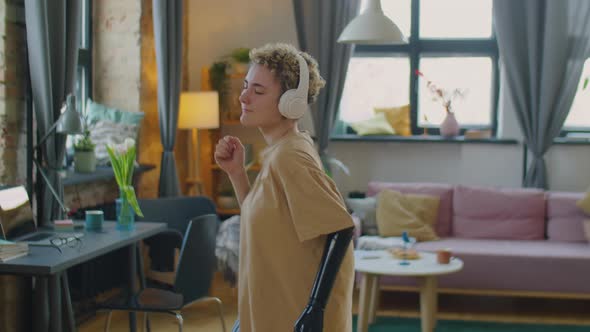 Girl with Prosthetic Arm Dancing at Home