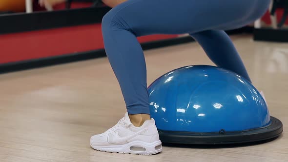 Slow Motion Close View Girl Slim Legs Jump on Stability Ball