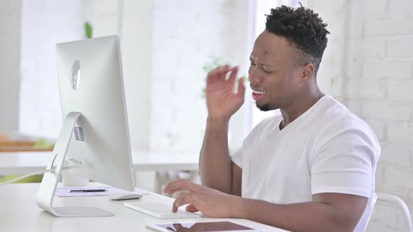 Hardworking Casual African Man Having Neck Pain