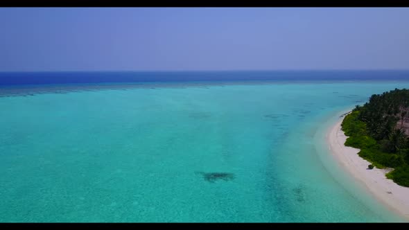 Aerial top down tourism of tranquil resort beach holiday by blue lagoon and white sand background of