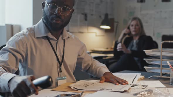 African American Agent Talking on Phone