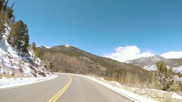 POV point of view -Driving through Rocky Mountain National Park in the Spring.