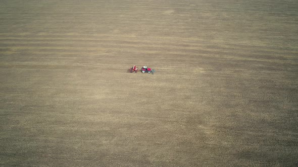 tractor in French Vexin Regional Natural Park seen from the sky