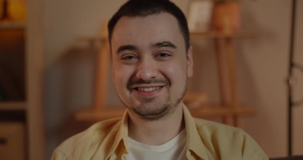 Crop View of Happy Man Turning Head and Looking To Camera