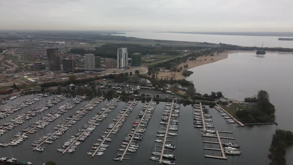 Aerial of Almeerderstrand and Muiderzand Marina Harbour Residential Appartements Modern Building