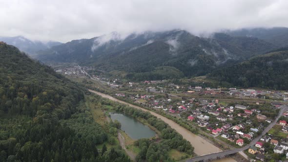 Aerial View of the Village in the Carpathian Mountains in Autumn. Ukraine