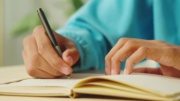 African American Man Writing Closeup