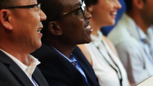 Business Executives Participating in a Business Meeting