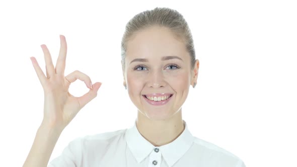 Businesswoman Showing Ok Sign, White Background