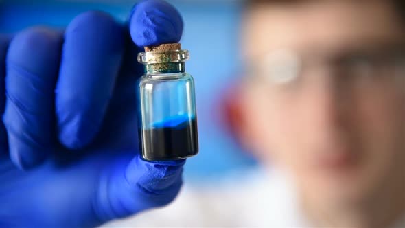 Scientist Holding Sample