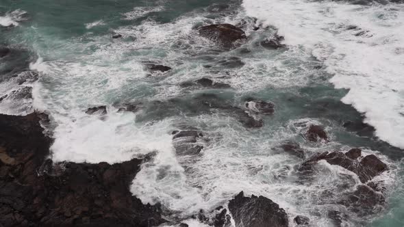 Calming peaceful Footage of beautiful blue ocean waves crashing the rocky shore at Loch Ard Gorge 12