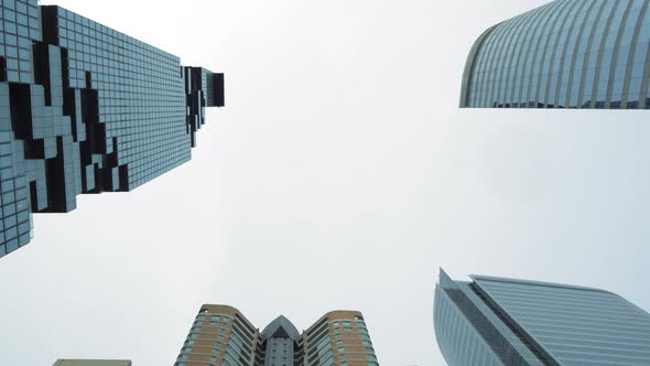 Skyscrapers with glass surface rise in the business district of the city