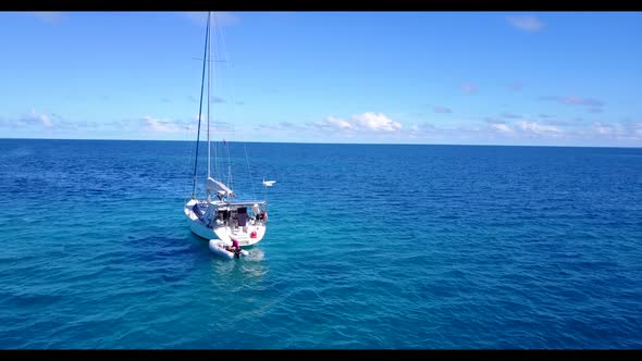 Aerial top down scenery of luxury shore beach adventure by blue ocean with white sand background of 