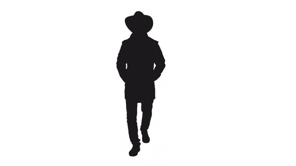 Black And White Silhouette of Stylish Man In Cowboy Hat Moving alt