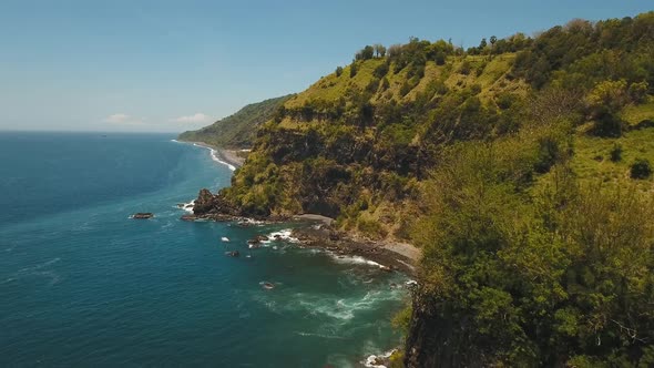 Seascape Cliffs Sea and Waves at Bali Indonesia