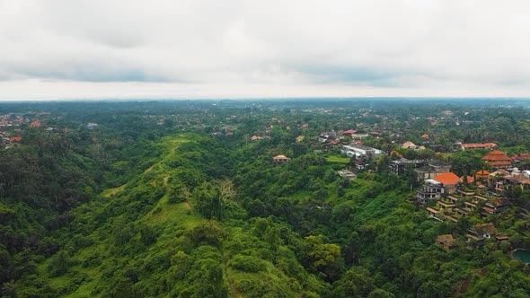 Beautiful cinematic Ubud, Bali drone footage with exotic rice terrace, small farms, village houses a