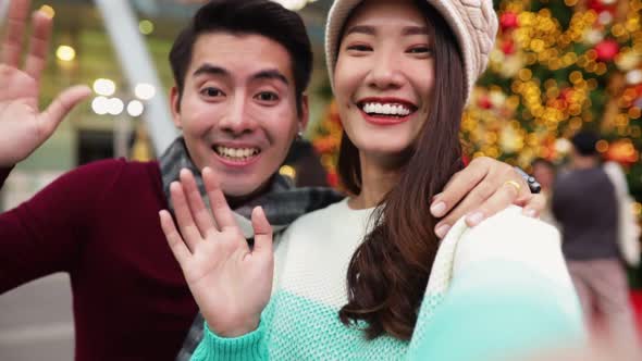 Merry Christmas and Happy New Year. Young  asian couple with Christmas