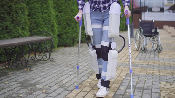 Walking in the Robotic Exoskeleton Outdoor Close Up