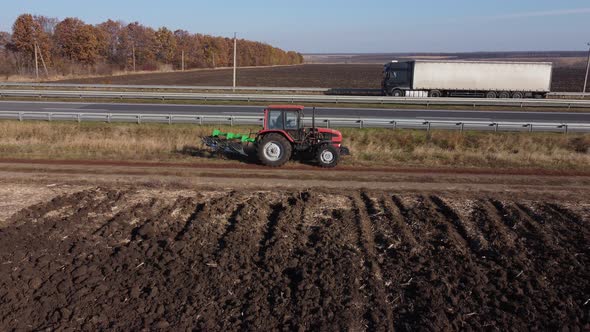 red tractor foreshortening profile, Ukraine