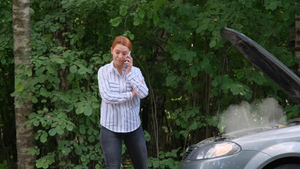 Young Woman on Countryside Road Trying To Get Help with Her Broken Down Car and Call Evacuation