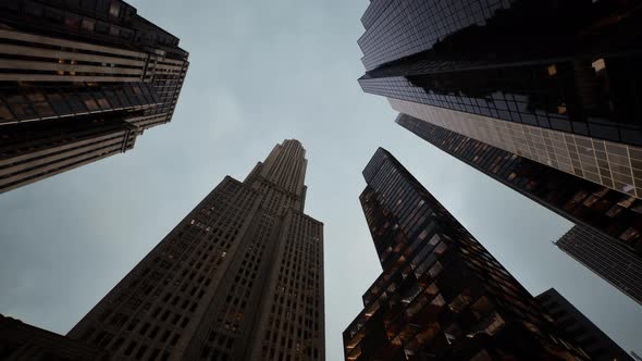 Skyscrapper Building Under a Cloudy Sky