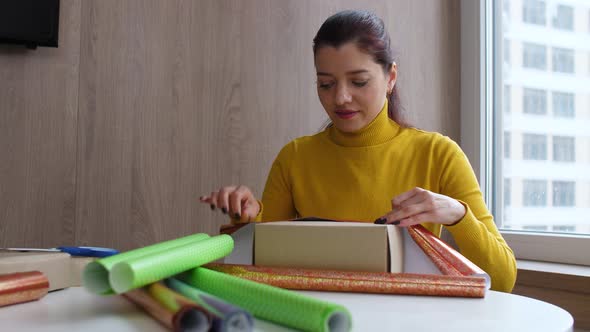 Girl at Home Fiddling with Gifts