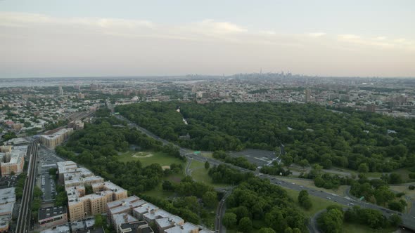 Aerial Panning Shot of Bronx River Parkway and NYC Skyline
