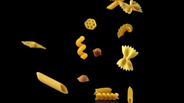 Super Slow Motion Different Kinds of Dry Pasta Fall